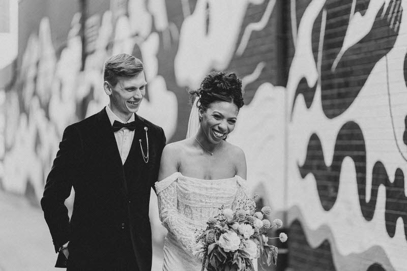 Bride and groom in wedding attire celebrate