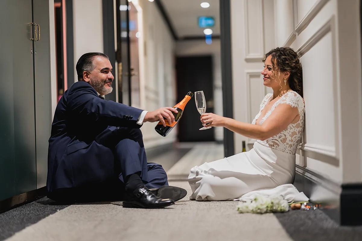 Documentary-style photo of the bride and groom on their wedding day at The Broadview Hotel