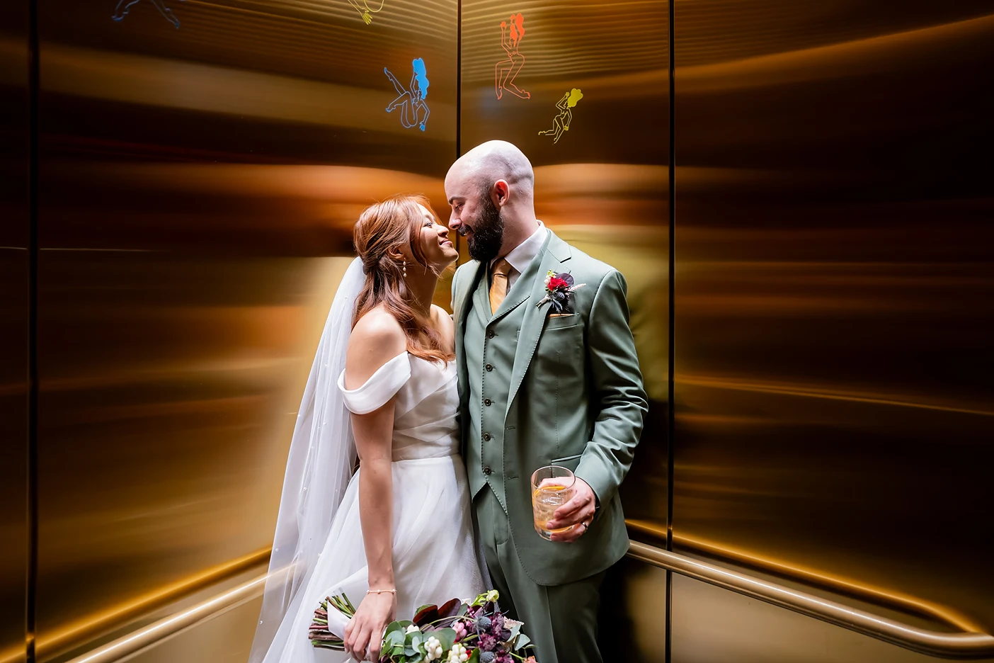 bride and groom in the elevator at the Drake Hotel