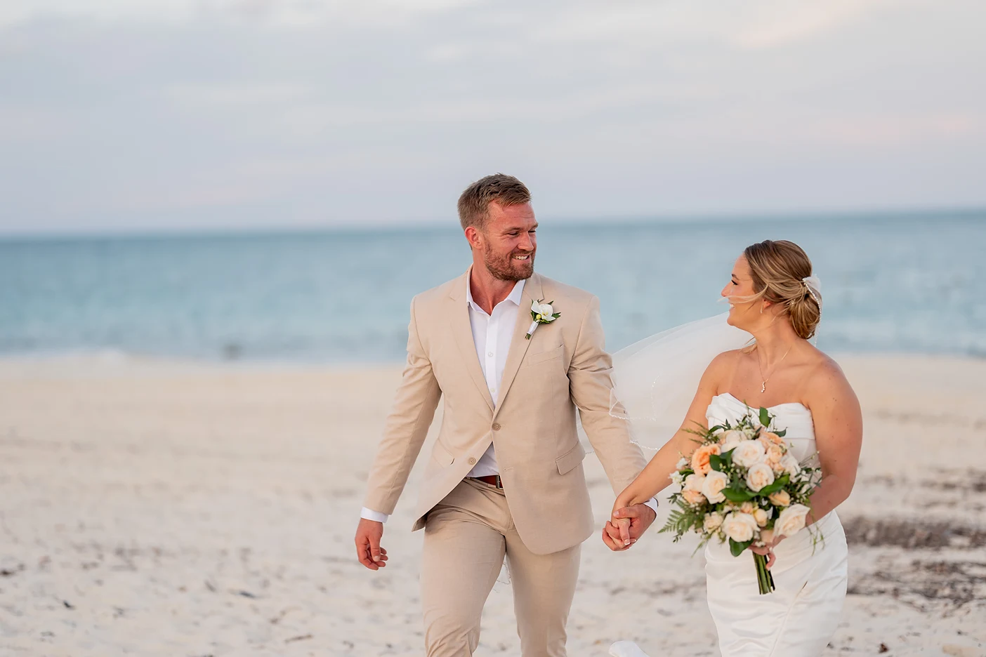bride and groom on the beach