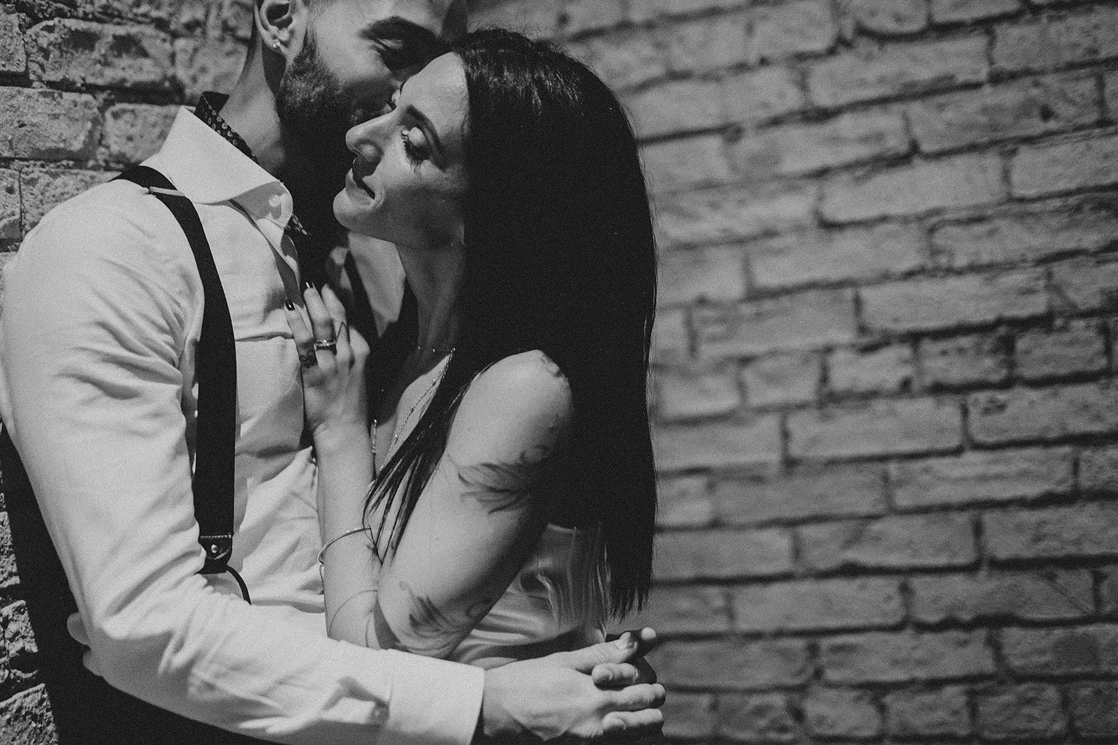 Candid moment of the couple with Bride