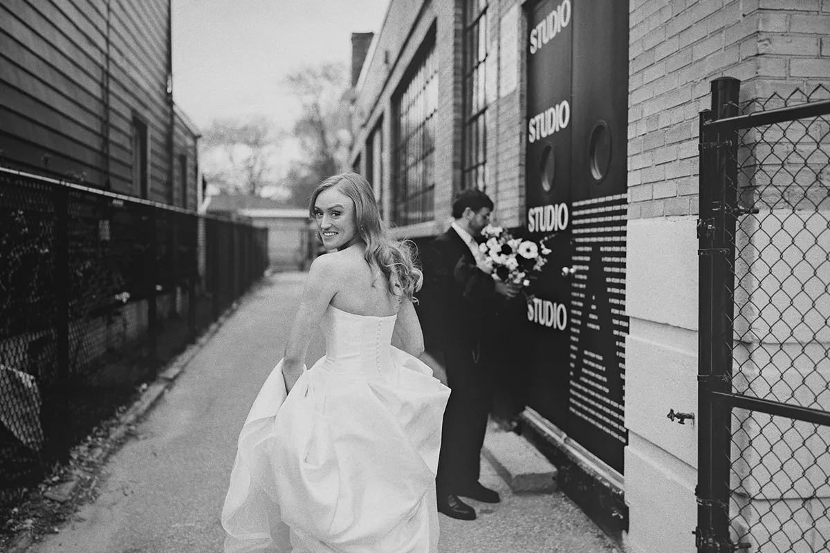 Carolyn looks back with a smile while walking