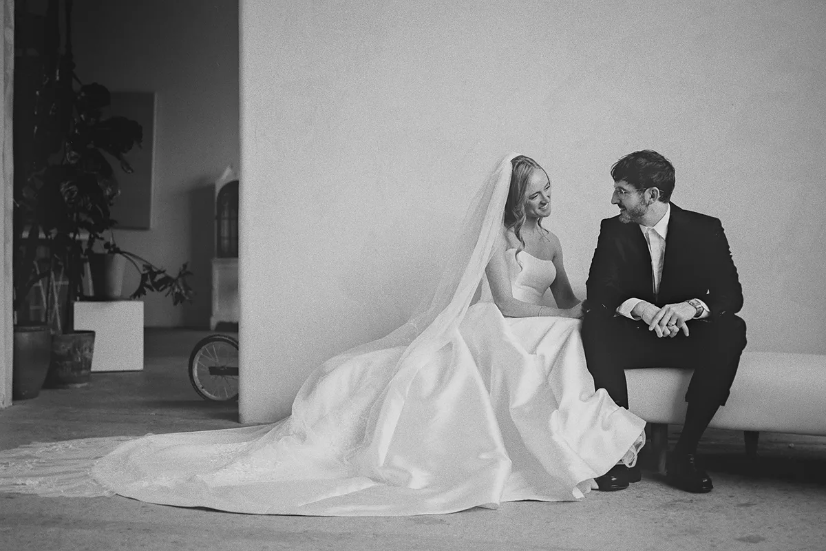 Carolyn and Mark laugh together in the studio