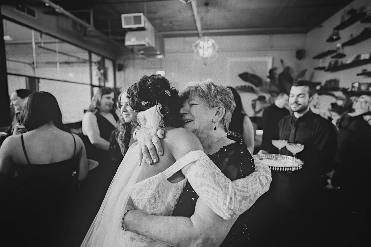 Cherise receives a heartfelt hug from a family member.