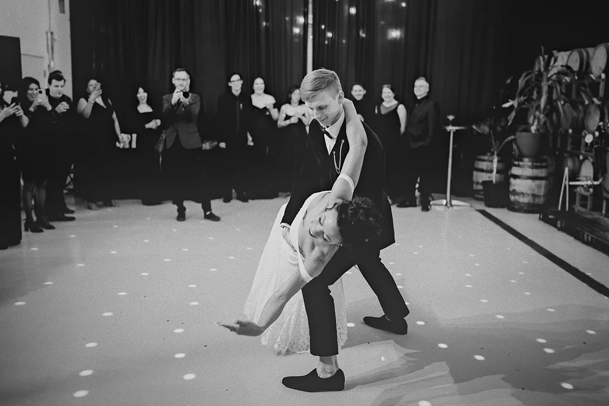 Konrad dips Cherise at the end of their first dance.