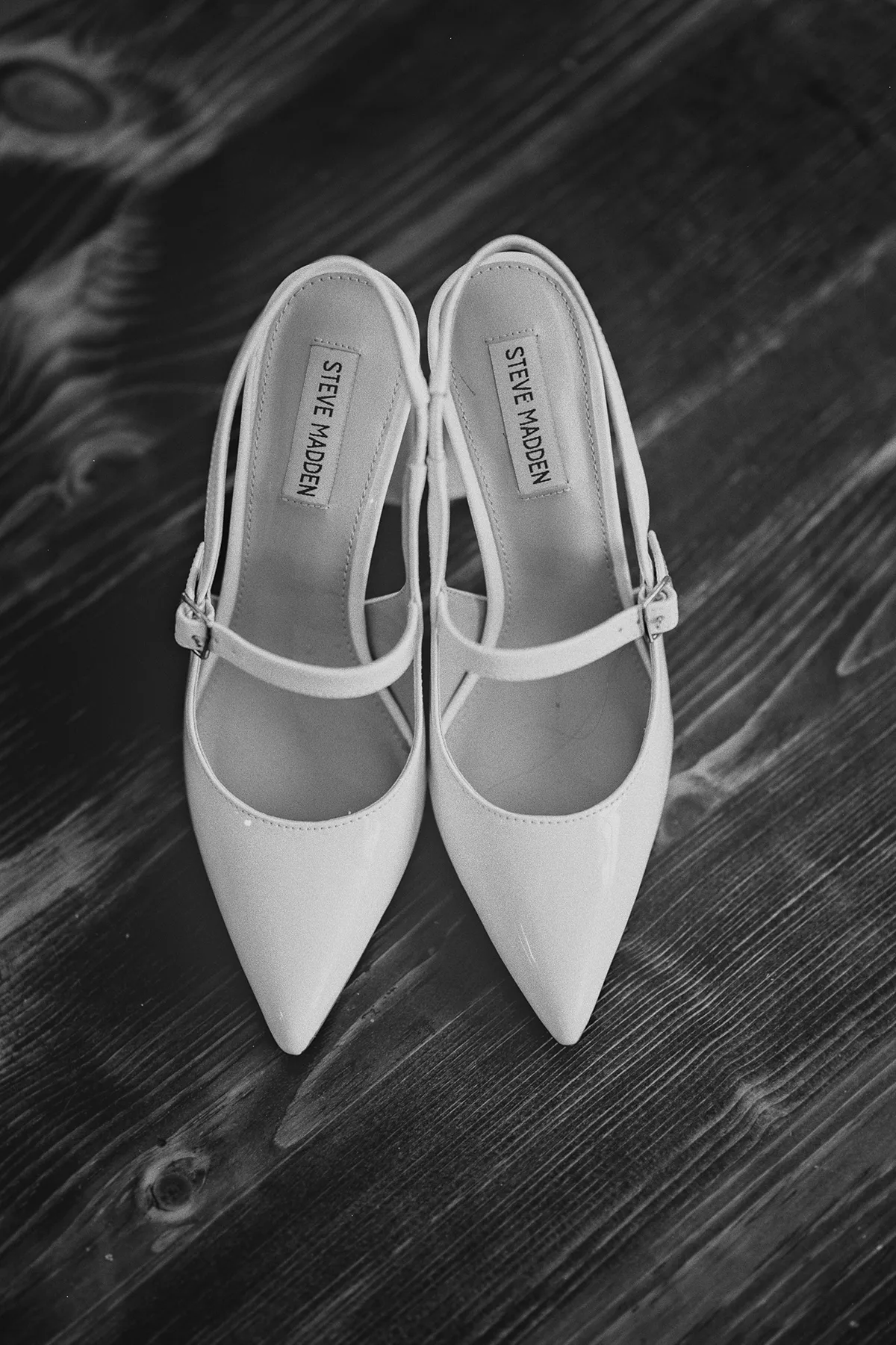 The bride's white Steve Madden wedding shoes