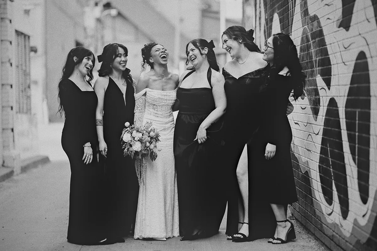 A joyful, candid moment with the bride and bridesmaids