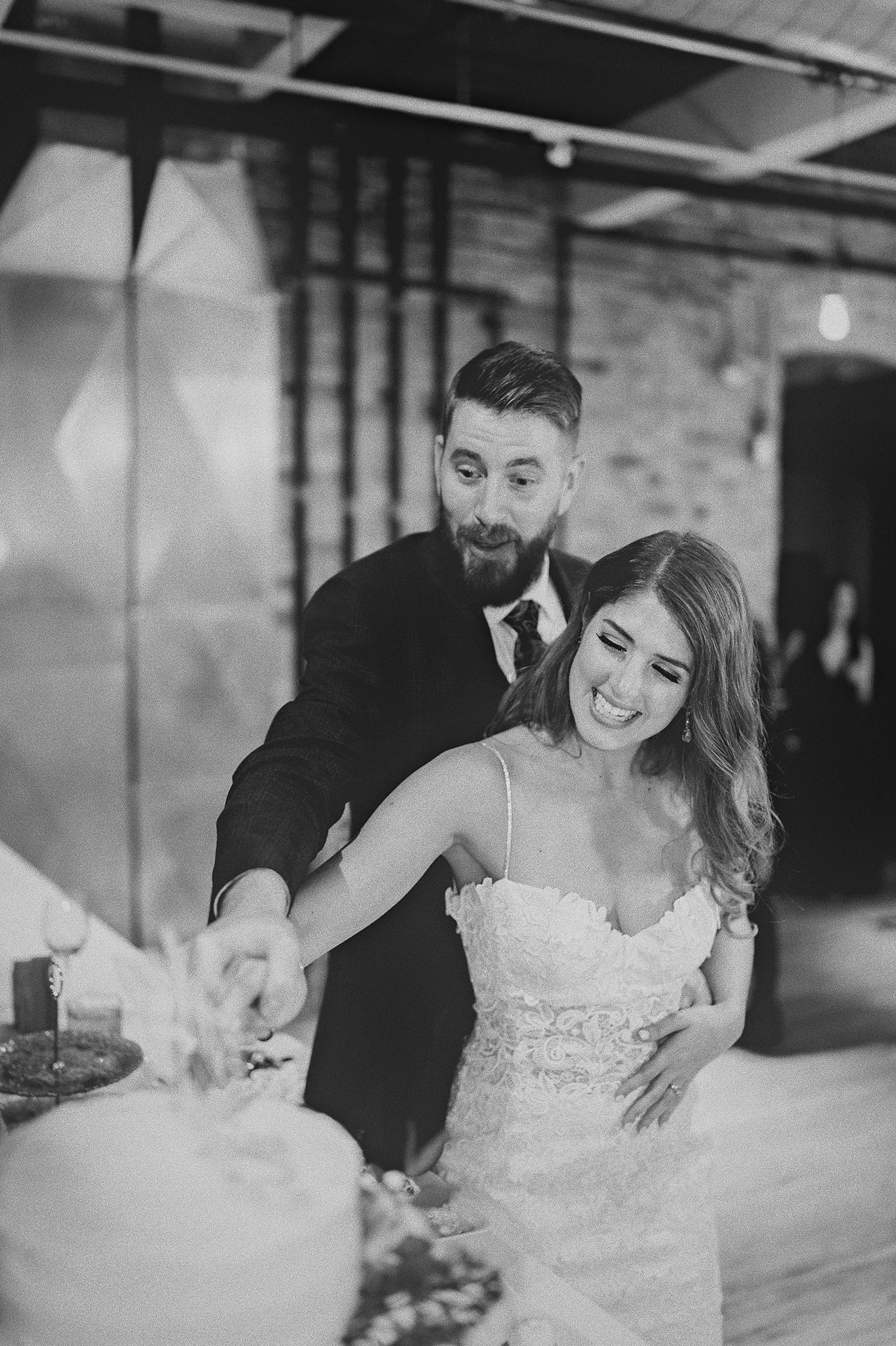 Daniela and Ryan cut their wedding cake together