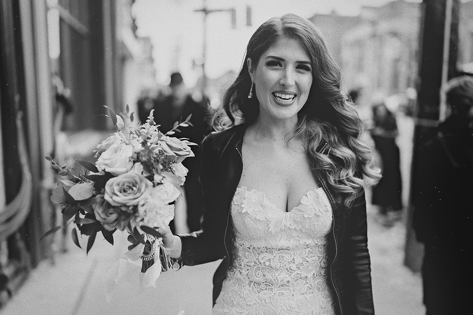 Daniela smiles as she walks down the street