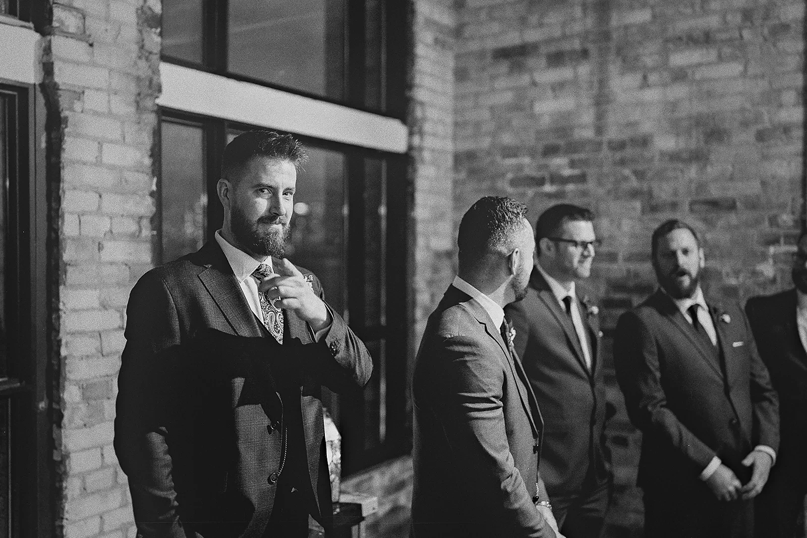 Ryan waits for his bride at the altar