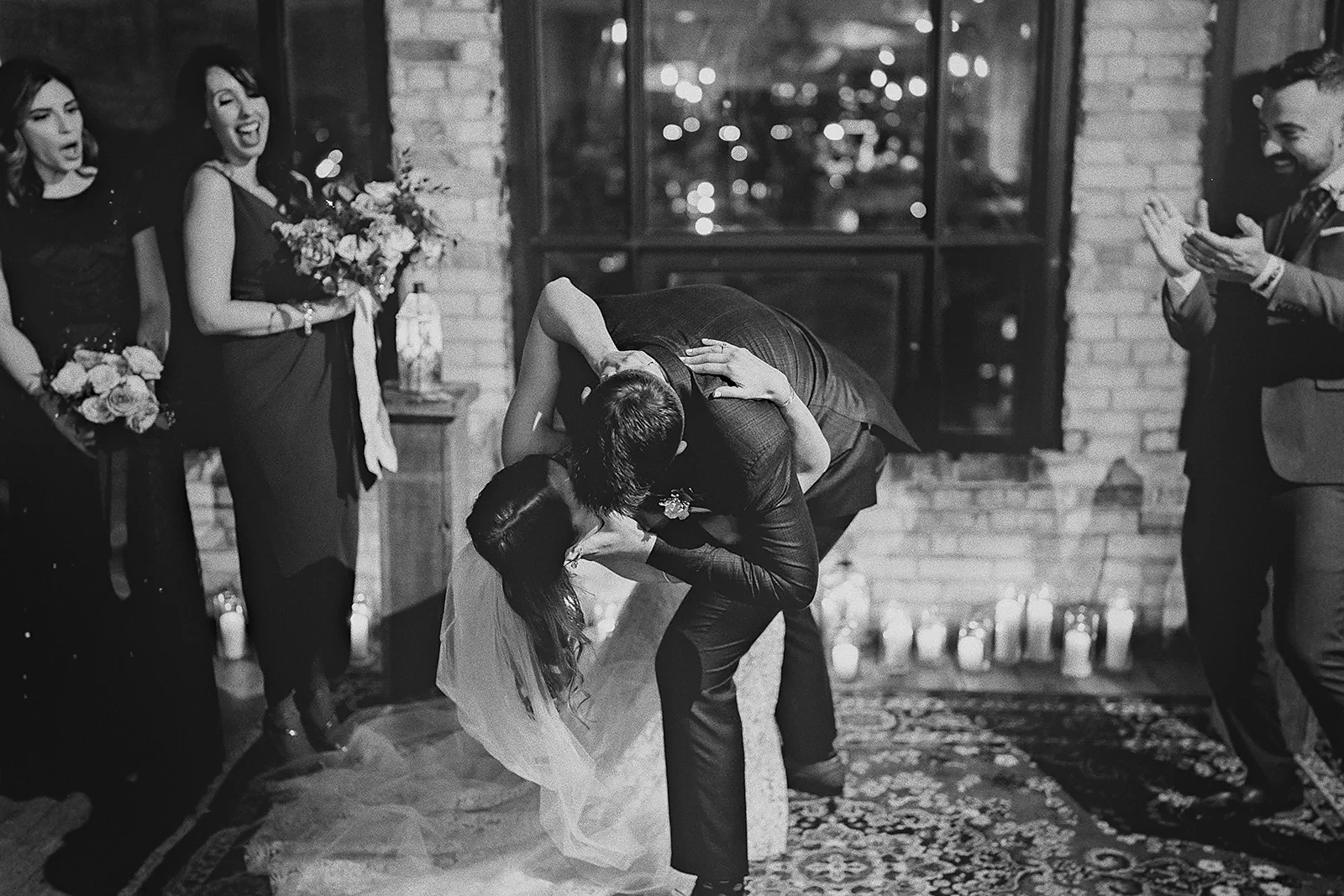 Ryan dips Daniela for a dramatic wedding kiss