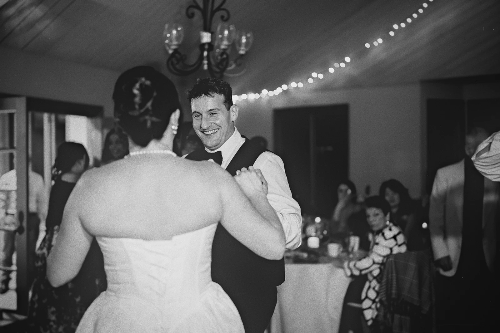 Kieran smiles at Hillary on the dance floor.