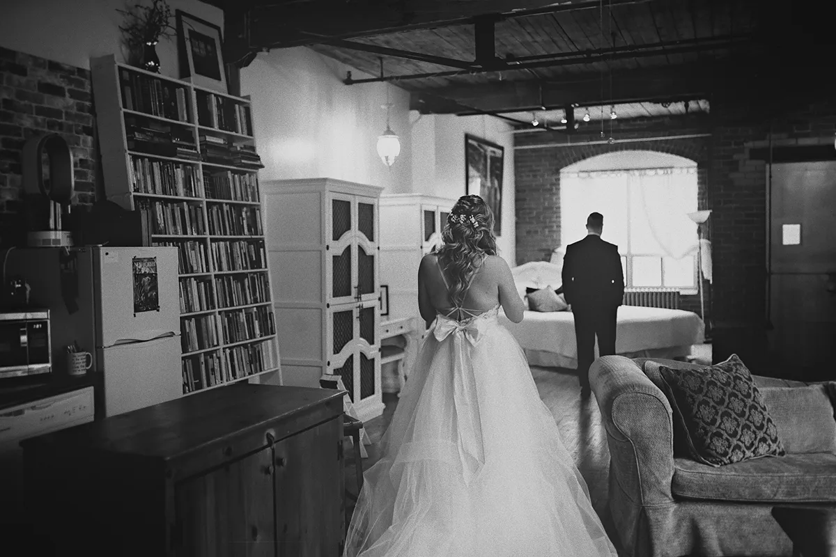 Jessi approaches Alex from behind for the first look