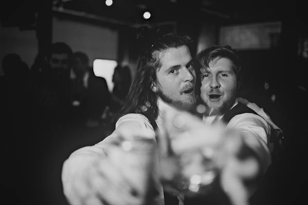 Two guests get playful for the camera.
