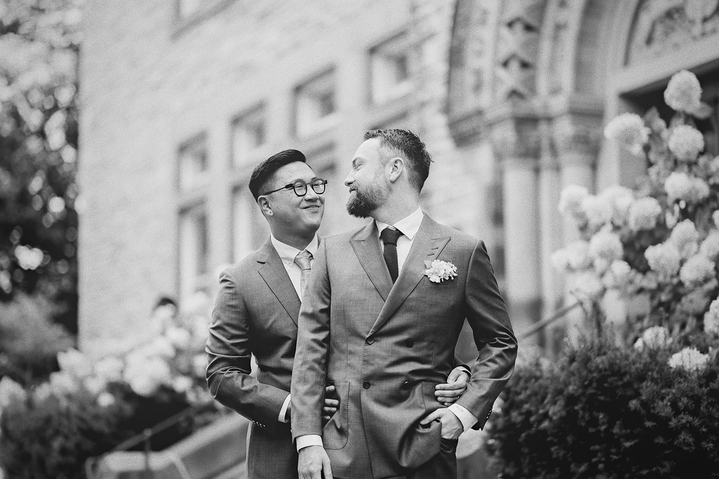 Ky joins Connor, placing his hands on his waist as they share a look.
