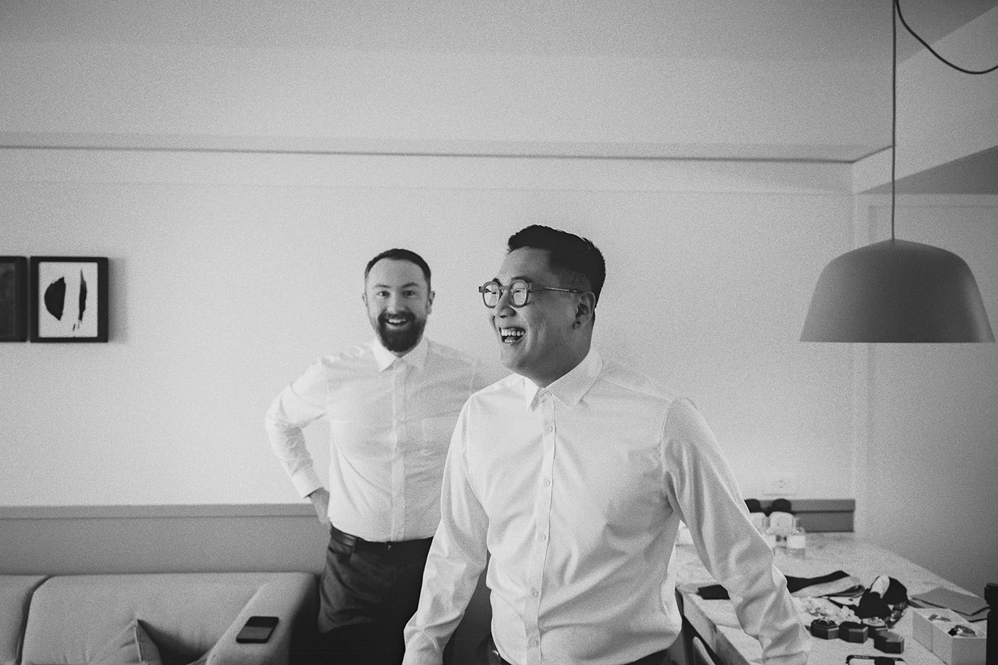 Ky and Connor share a lighthearted moment while getting ready for their wedding ceremony.