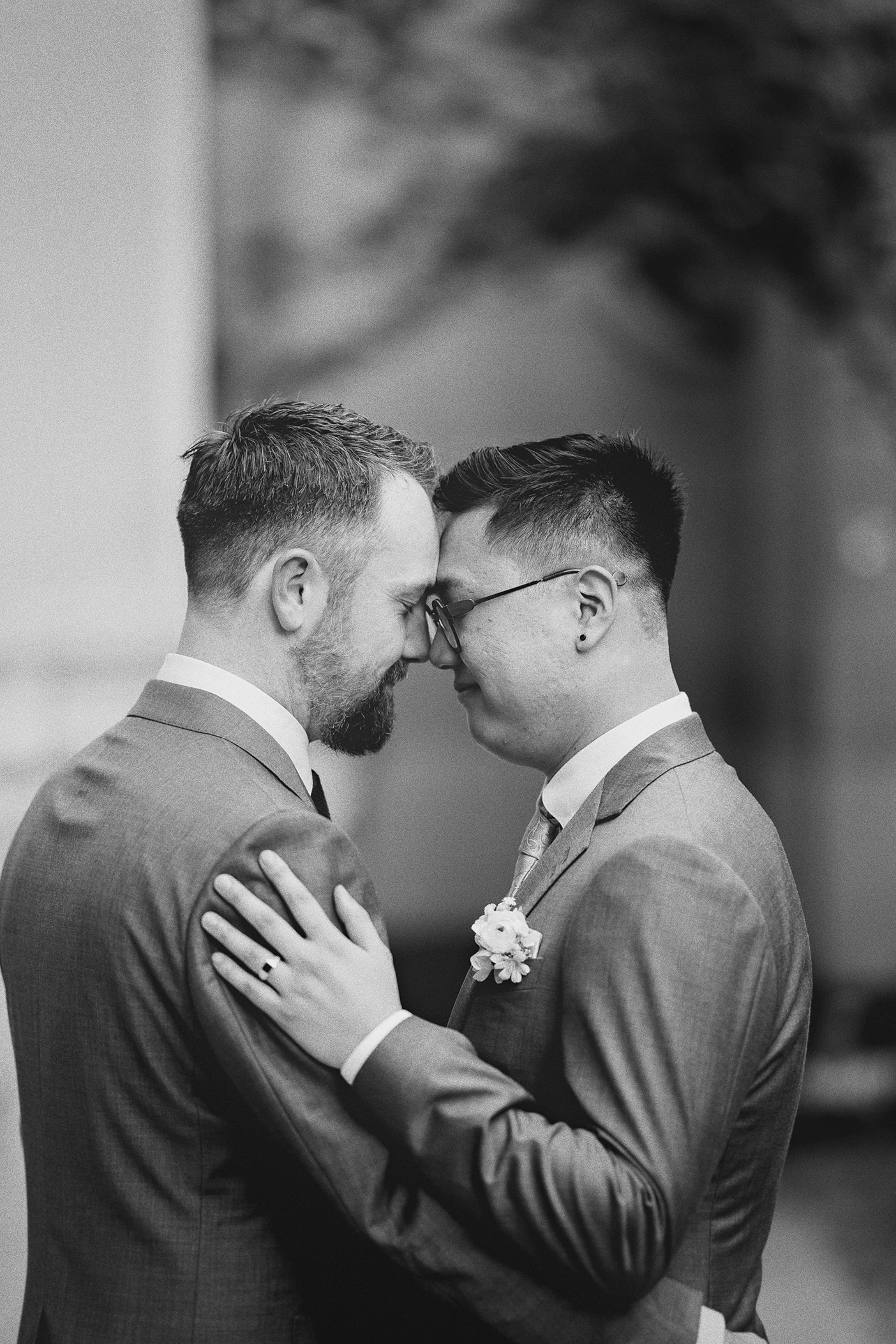 A close-up captures the couple's intimate embrace.