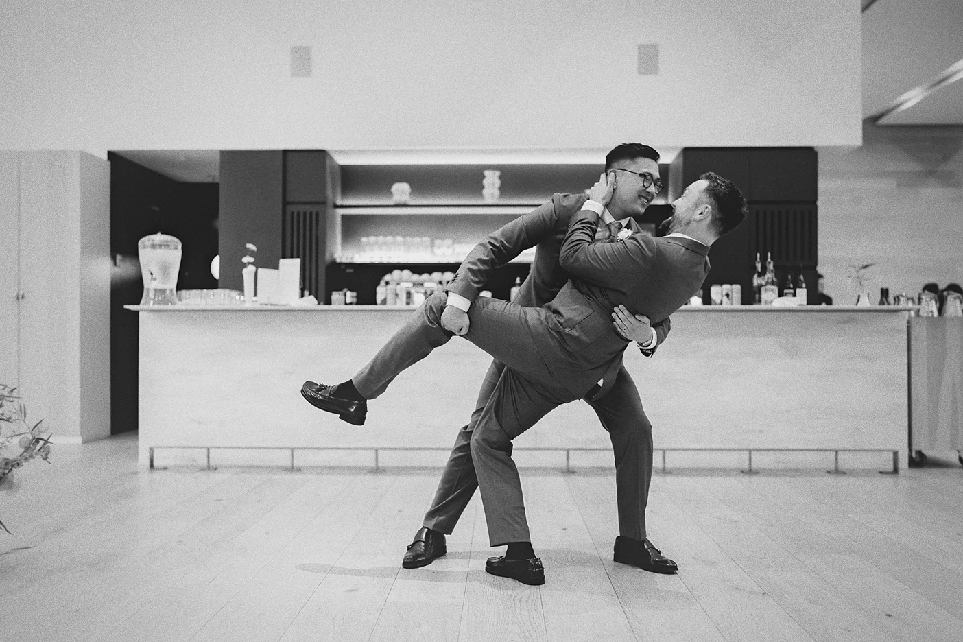 Connor lifts Ky in a dramatic pose during their first dance.