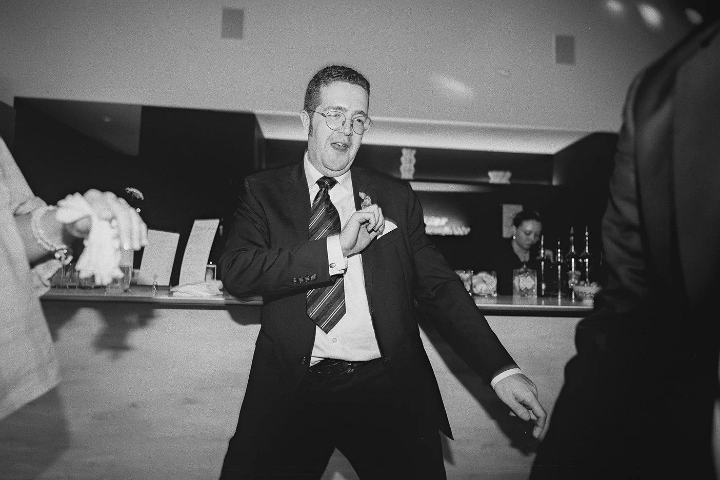 A guest enjoys the music on the dance floor.