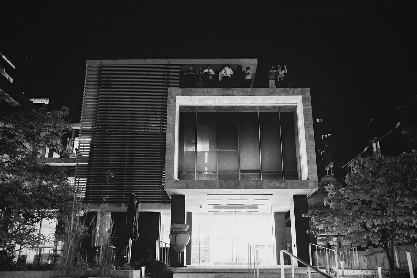 The Gardiner Museum is beautifully lit up at night.