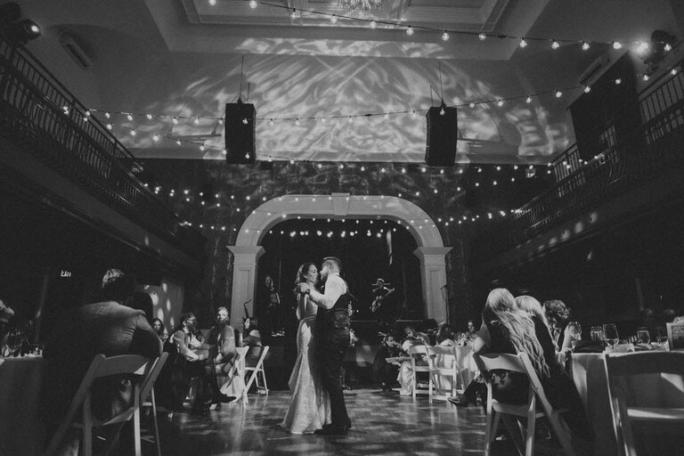 a Bride and Groom share their first dance in the Main Hall of The Great Hall, Toronto